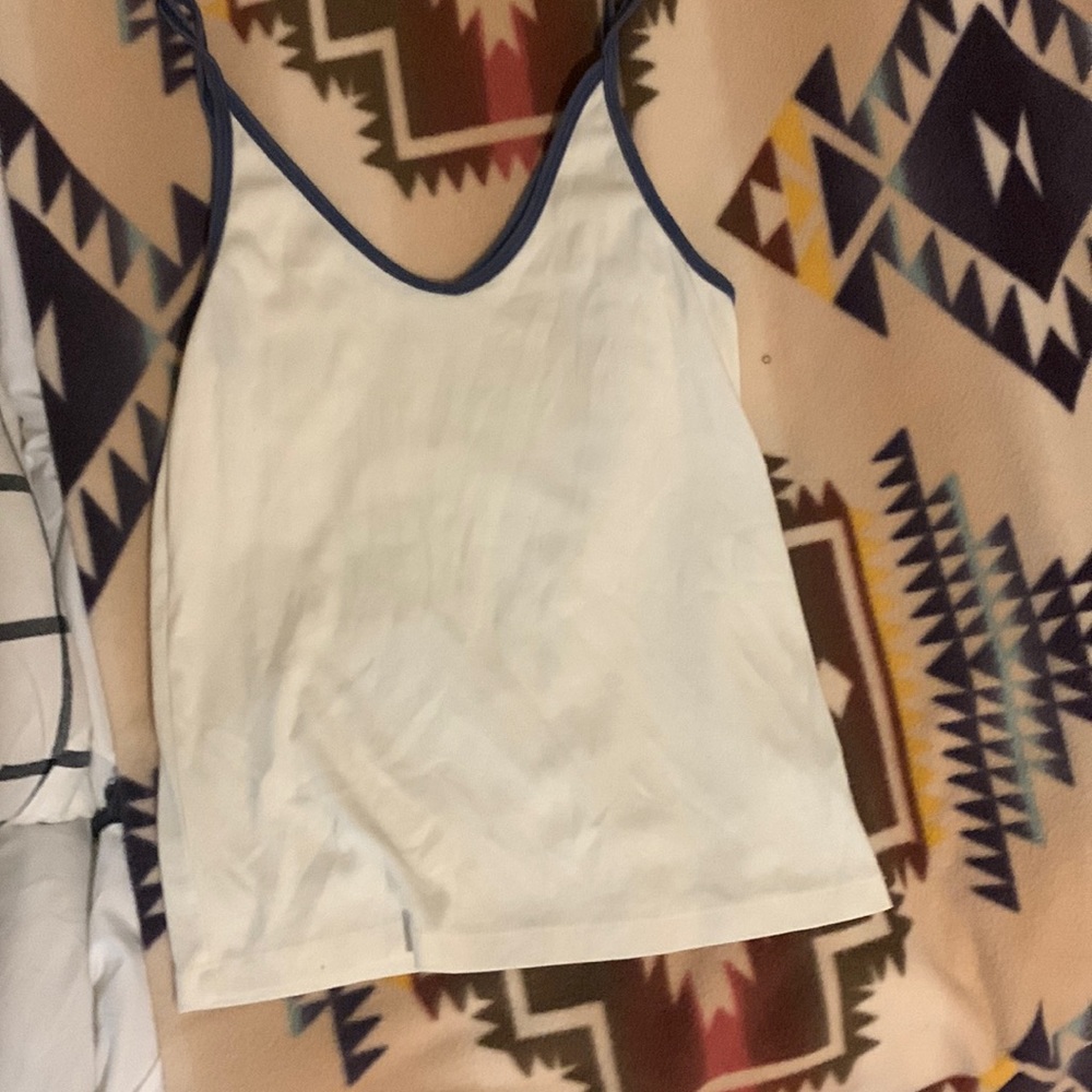 With tank top with blue lined straps
